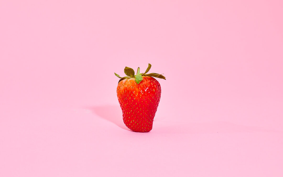 Strawberry on pink background