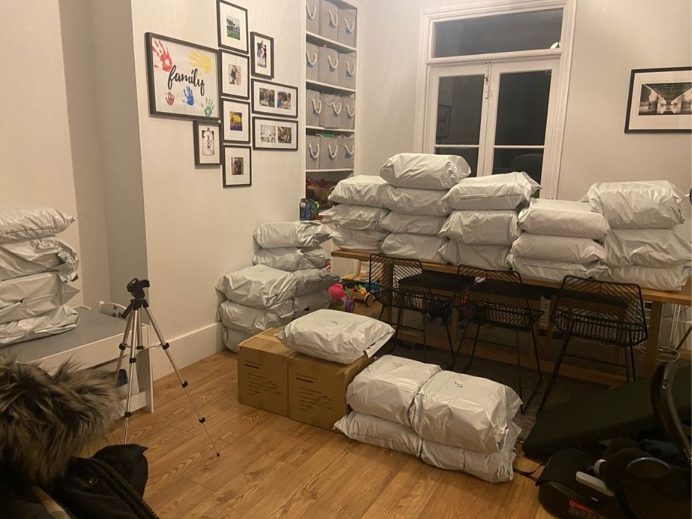 Room in a house full of packages ready to post